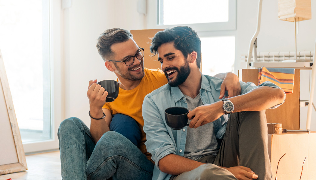 couple smiling in new home