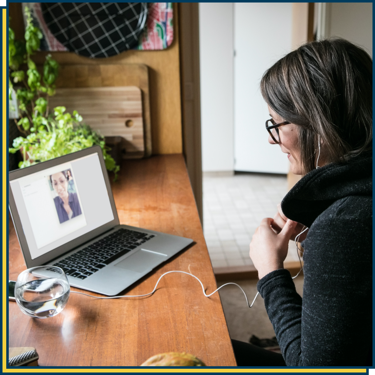 Woman on laptop virtual meeting
